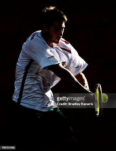 Carsten Ball of Australia plays a backhand during his match against Tatsuma Ito of Japan during the match between Australia and Japan on day three of...