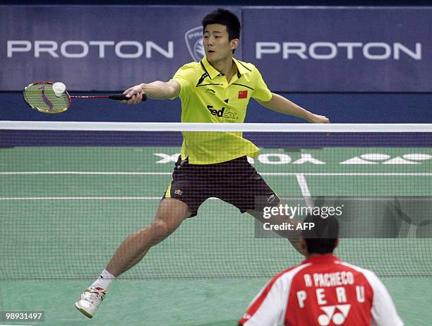 China's Chen Long plays a shot against Peru's Rodrigo Pachecc during the preliminary round of the Thomas Cup badminton championship in Kuala Lumpur...