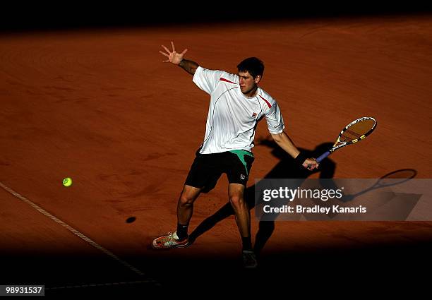 Carsten Ball of Australia plays a forehand during his match against Tatsuma Ito of Japan during the match between Australia and Japan on day three of...