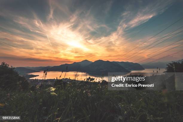 sunset @ iseo lake - iseo stock pictures, royalty-free photos & images