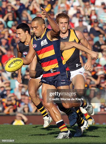 Andrew McLeod of the Crows kicks the ball during the round seven AFL match between the Adelaide Crows and the Richmond Tigers at AAMI Stadium on May...