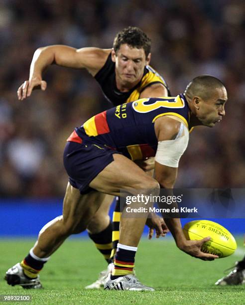 Andrew Mcleod of the Crows runs with the ball during the round seven AFL match between the Adelaide Crows and the Richmond Tigers at AAMI Stadium on...