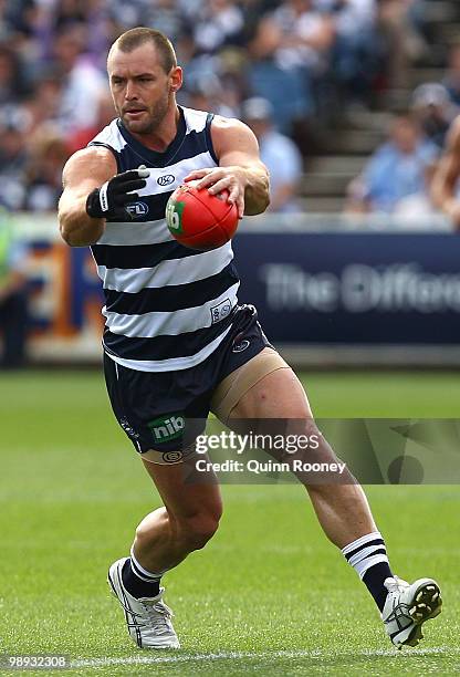 Josh Hunt of the Cats kicks during the round seven AFL match between the Geelong Cats and the Sydney Swans at Skilled Stadium on May 9, 2010 in...