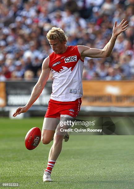 Ed Barlow of the Swans kicks during the round seven AFL match between the Geelong Cats and the Sydney Swans at Skilled Stadium on May 9, 2010 in...