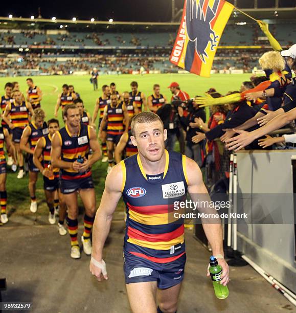 Simon Goodwin of the Crows leads the players off the field after the win during the round seven AFL match between the Adelaide Crows and the Richmond...