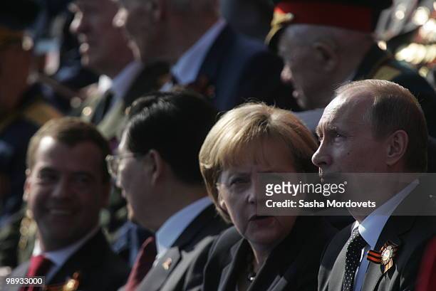 Russian President Dmitry Medvedev, China's President Hu Jintao, German Chancellor Angela Merkel, Russian Prime Minister Vladimir Putin attend the...
