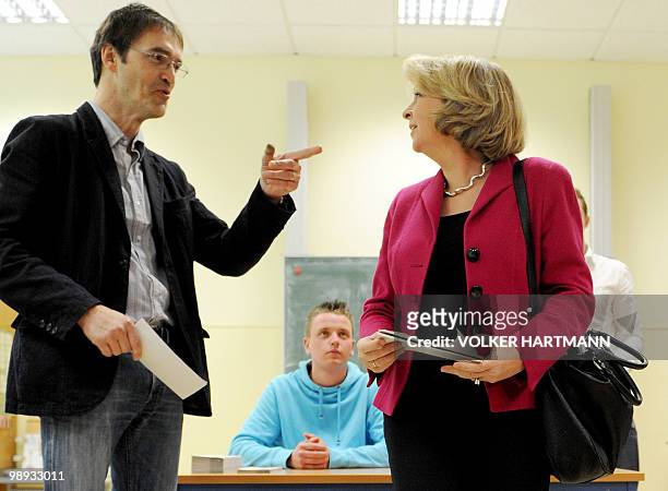 The Social Democrats main candidate Hannelore Kraft and her husband Udo cast their votes during regional elections in the western German state of...