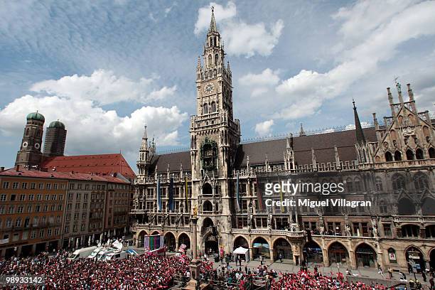 Fans wait in front of the city hall for the players of Bayern Muenchen to present the German championship trophy on the balcony of the city hall...