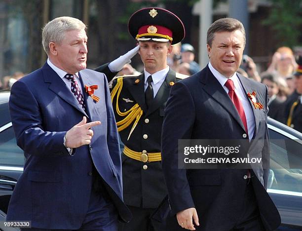 Ukrainian President Viktor Yanukovych and Minister of Defence Mykhailo Yezhel arrive on Kiev�s Independence square to attend the Victory Day military...