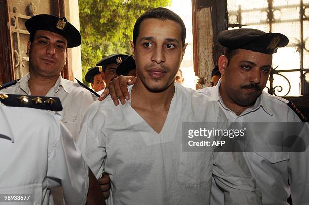 Egyptian Mahmud Essawi , a suspect in the murder of Moroccan singer Leila Ghofran's daughter, arrives to attend a hearing in his retrial at a court...