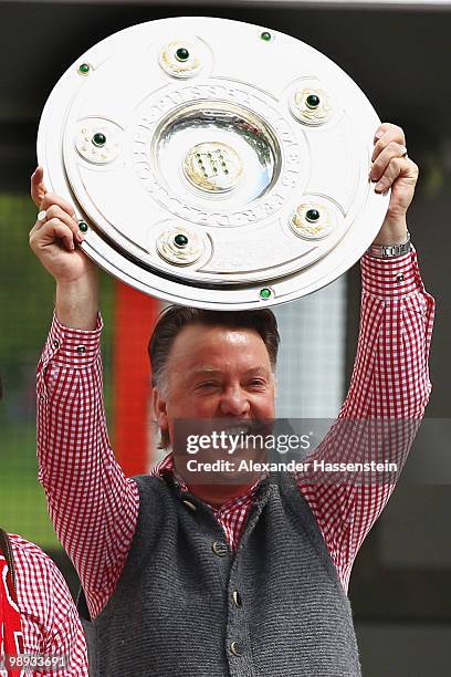 Louis van Gaal, head coach of Bayern Muenchen celebrates the German championship with the trophy on the way to the champions party at the Marien...