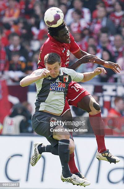 Rodnei of Kaiserslautern outjumps Daniel Baier of Augsburg during the Second Bundesliga match between 1. FC Kaiserslautern and FC Augsburg at the...