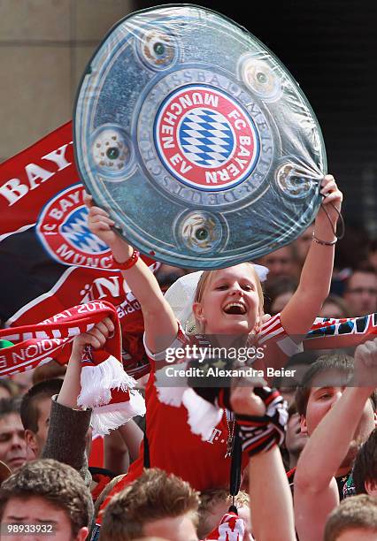 Fans of Bayern Muenchen celebrate their team's German championship title at the town hall square on May 9, 2010 in Munich, Germany.