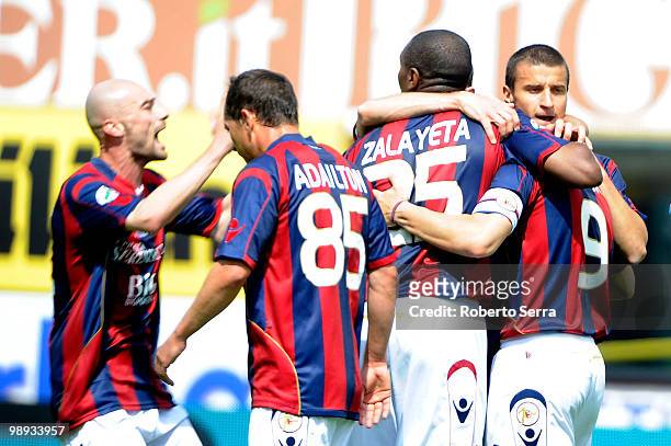 Marco Di Vaio is congratulated by his teamates after scoring the opening goal during the Serie A match between Bologna FC and Catania Calcio at...