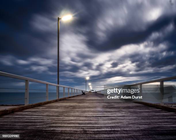 sliding into night - colour - durst stock pictures, royalty-free photos & images