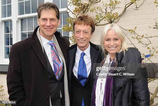 Simon MacCorkindale, Robin Gibb and Susan George attend a plaque unveiling for the late actor, Sir John Mills at Pinewood Studios on May 9, 2010 in...