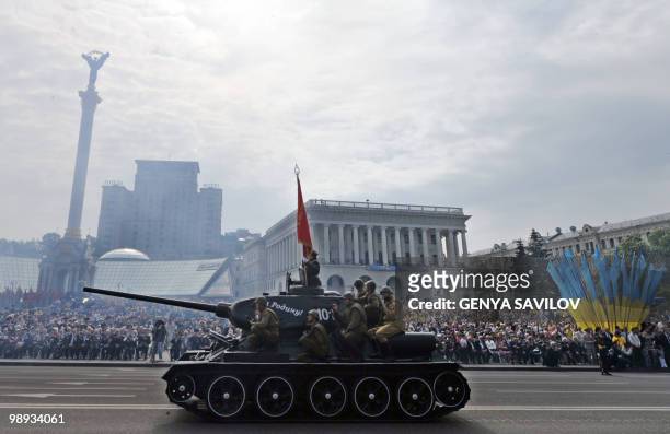 Soviet T-34 battle tank takes part in a Victory Day parade in Kiev on May 9 marking the 65th anniversary of the end of World War II. AFP PHOTO /...
