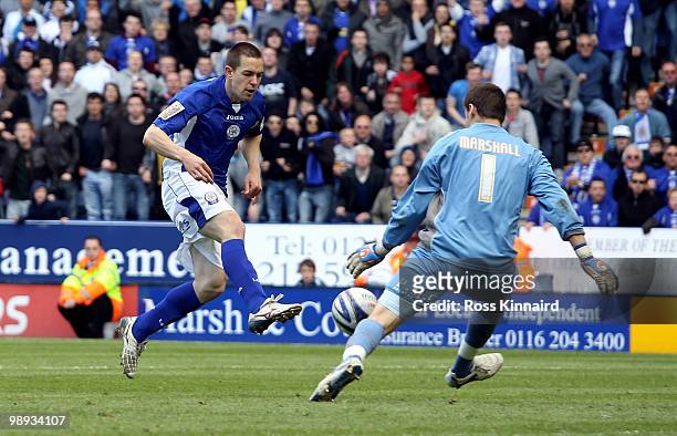 David Marshall of Cardiff saves from Matty Fryatt of Leicester during the Coca-Cola Championship Playoff Semi Final 1st Leg between Leicester City...