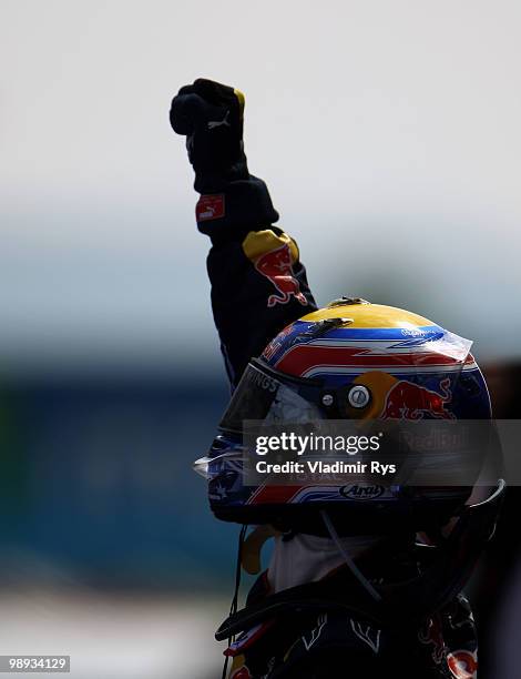 Mark Webber of Australia and Red Bull Racing celebrates in parc ferme after winning the Spanish Formula One Grand Prix at the Circuit de Catalunya on...