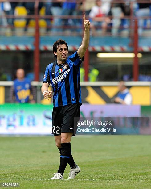 Diego Milito of FC Internazionale Milano celebrates after the third goal during the Serie A match between FC Internazionale Milano and AC Chievo...