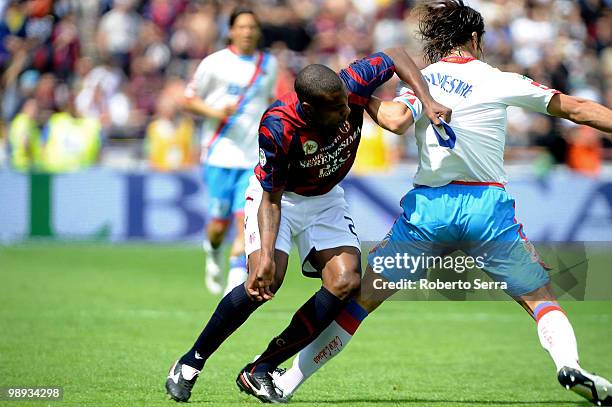 Marcelo Danubio Zalayeta of Bologna FC competes the ball with Matias Augustin Silvestre of Ctania during the Serie A match between Bologna FC and...