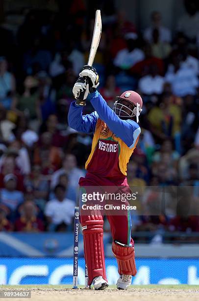 Chris Gayle of West Indies hits a six during the ICC World Twenty20 Super Eight match between West Indies and India at the Kensington Oval on May 9,...