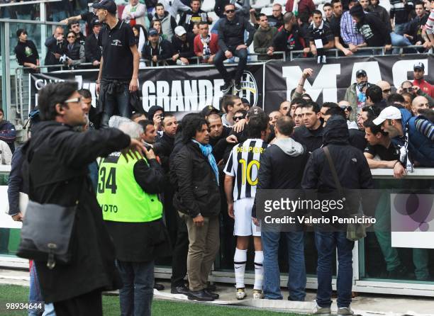 Alessandro Del Piero of Juventus FC speaks to fans requesting that they desist from throwing missiles during the Serie A match between Juventus FC...