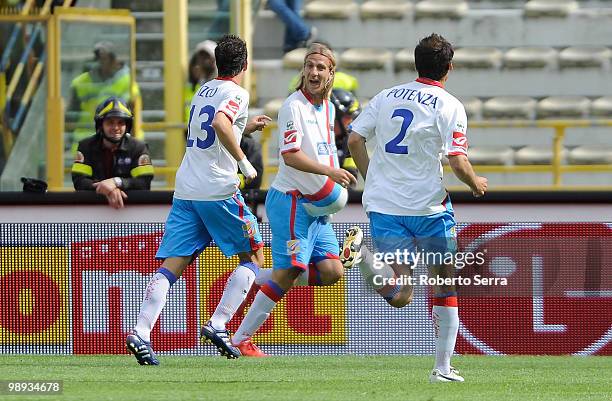 Maxi Lopez of Catania celebrates with his teamates after scoring a goal during the Serie A match between Bologna FC and Catania Calcio at Stadio...