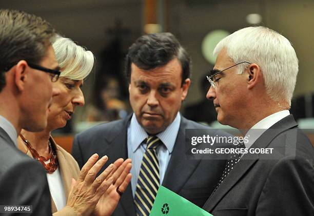 French Finance Minister Christine Lagarde , Irish Finance Minister Brian Lenihan and British Chancelor of the Exchequer Alistair Darling talk before...