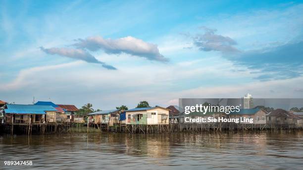 kampung in sibu - sibu river stock pictures, royalty-free photos & images