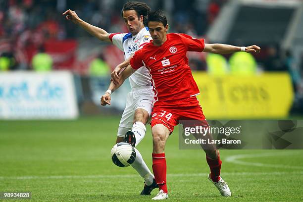 Danielsson of Rostock challenges Martin Harnik of Duesseldorf during the Second Bundesliga match between Fortuna Duesseldorf and FC Hansa Rostock at...