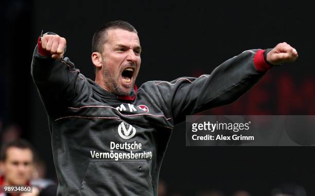 Head coach Marco Kurz of Lautern celebrates during the Second Bundesliga match between 1. FC Kaiserslautern and FC Augsburg at the Fritz-Walter...