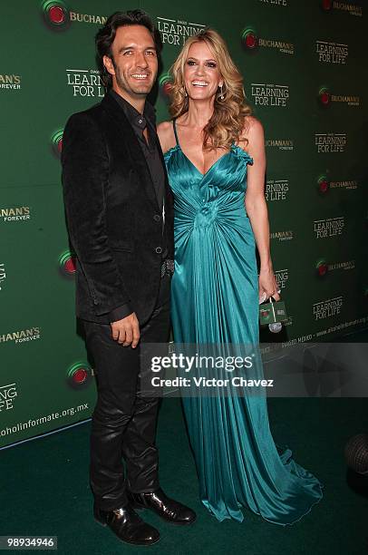 Singer Leonardo de Lozanne of Fobia and tv personality Rebeca de Alba attend the Buchanan's Forever 2010: Learning For Life at Colegio de las...