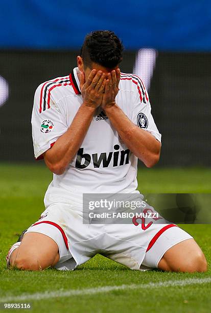 Milan's Marco Borriello reacts after missing a score and equalizer the match in extra time in their serie A football match against Genoa at Luigi...