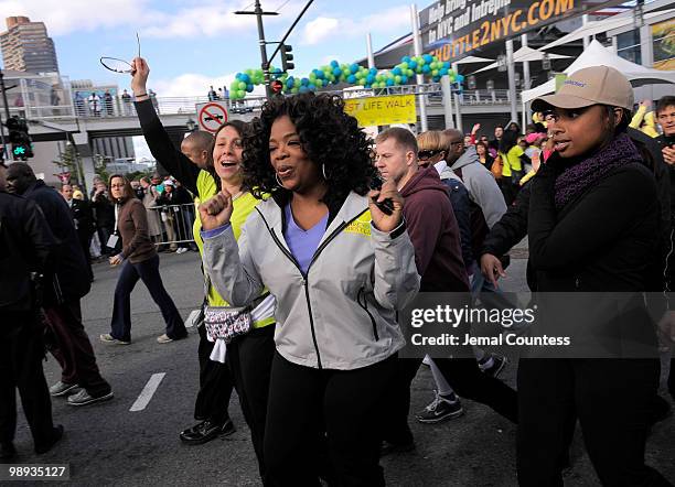 Media personality Oprah Winfrey and singer Jennifer Hudson at the start of the "Live Your Best Life Walk" to celebrate O, The Oprah Magazine's 10th...