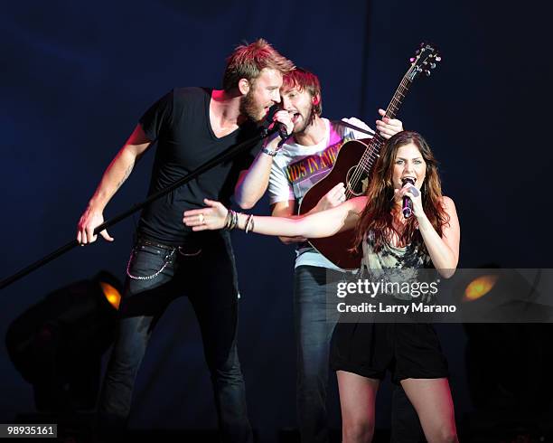 Charles Kelley, Dave Haywood and Hillary Scott of Lady Antebellum perform at Cruzan Amphitheatre on May 8, 2010 in West Palm Beach, Florida.