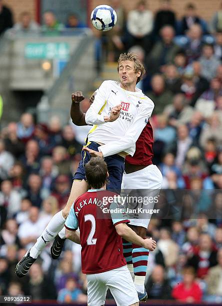 Peter Crouch of Tottenham Hotspur wins the header against Andre Bikey of Burnley during the Barclays Premier League match between Burnley and...