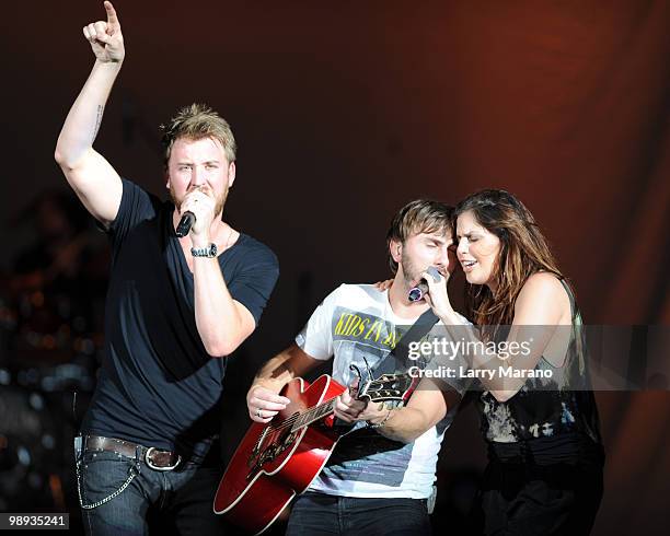 Charles Kelley, Dave Haywood and Hillary Scott of Lady Antebellum perform at Cruzan Amphitheatre on May 8, 2010 in West Palm Beach, Florida.