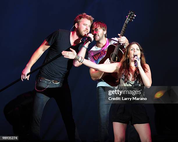 Charles Kelley, Dave Haywood and Hillary Scott of Lady Antebellum perform at Cruzan Amphitheatre on May 8, 2010 in West Palm Beach, Florida.