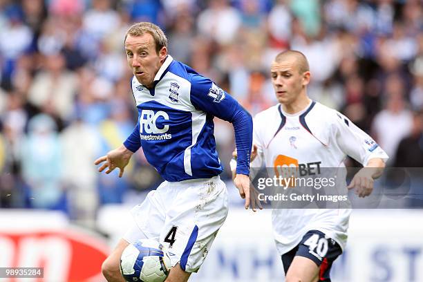 Birmingham City's Lee Bowyer holds off Bolton Wanderers's Vladimir Weiss during the Barclays Premier League match between Bolton Wanderers and...