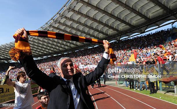 Roma's coach Claudio Ranieri celebrates after his team defeated Cagliari during their Italian Serie A football match on May 9, 2010 at Olimpico...