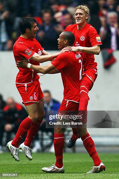 Anderson of Duesseldorf celebrates with team mates after scoring the second goal during the Second Bundesliga match between Fortuna Duesseldorf and...