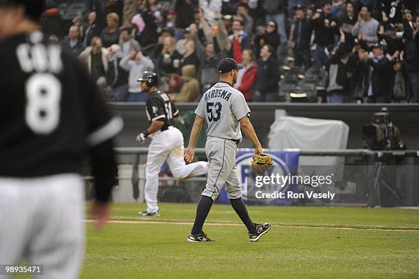 Alex Rios of the Chicago White Sox runs the bases after hitting a walk-off, two-run home run against David Aardsma of the Seattle Mariners on April...