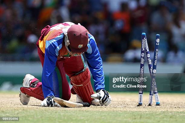 Chris Gayle of West Indies is run out by MS Dhoni of India on 98 runs during the ICC World Twenty20 Super Eight match between West Indies and India...