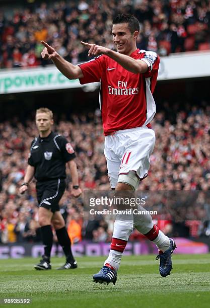 Robin Van Persie of Arsenal scores Arsenal's second goal during the Barclays Premier League match between Arsenal and Fulham at The Emirates Stadium...