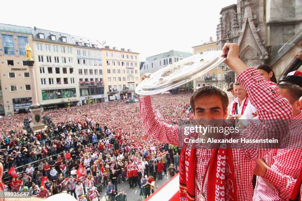 Philipp Lahm of Bayern Muenchen celebrates the German championship title on the balcony of the town hall on May 9, 2010 in Munich, Germany.