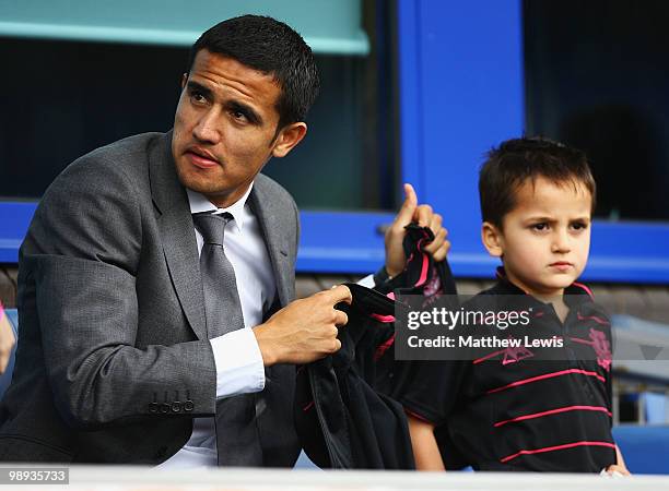 Tim Cahill of Everton pictured with his son during the Barclays Premier League match between Everton and Portsmouth at Goodison Park on May 9, 2010...