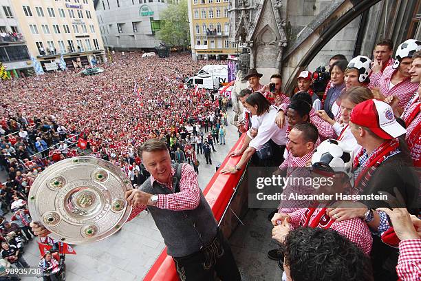 Head coach Louis van Gaal of Bayern Muenchen celebrates the German championship title on the balcony of the town hall on May 9, 2010 in Munich,...