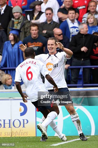 Bolton Wanderers's Kevin Davies celebrates his goal with Fabrice Muamba during the Barclays Premier League match between Bolton Wanderers and...