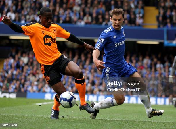 Maynor Figueroa of Wigan controls the ball as Branislav Ivanovic of Chelsea closes in during the Barclays Premier League match between Chelsea and...